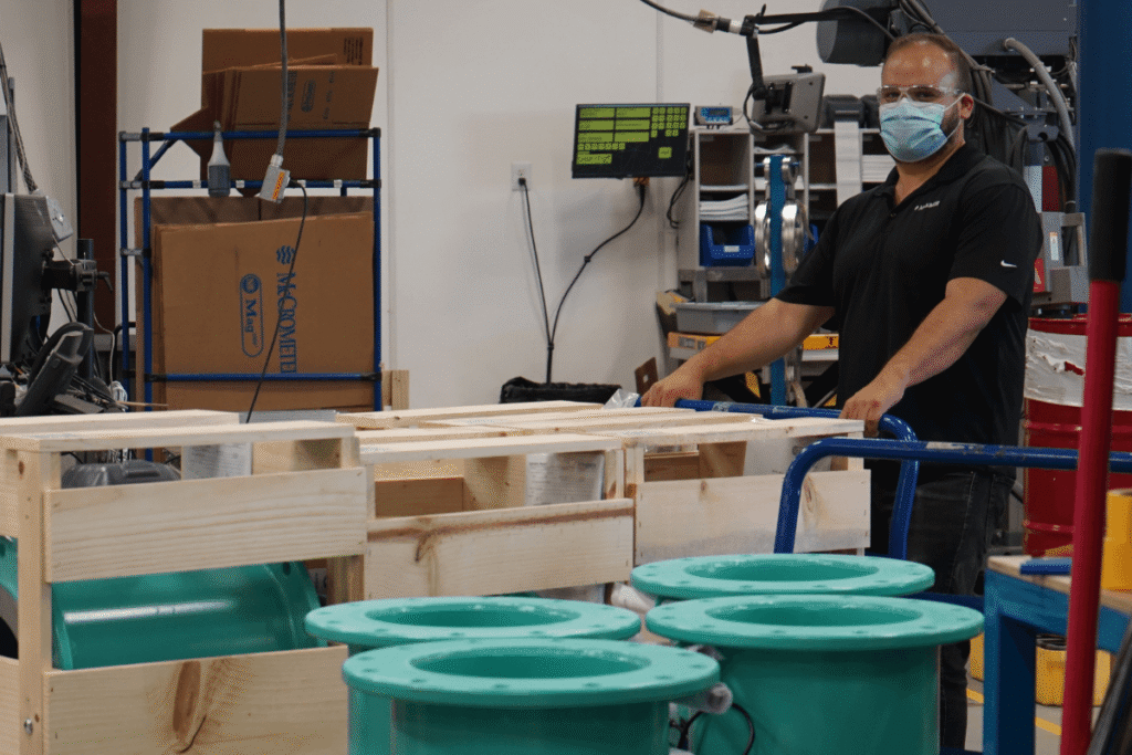 A McCrometer employee with Ultra Mag flow meters.