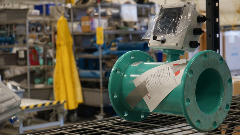 A full-bore mag meter with mounted electronics.