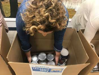A McCrometer employee donates to the United Way during McCrometer's two-week fundraising event in April of 2019.